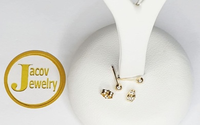 A pair of new ball model earrings in 14K yellow...