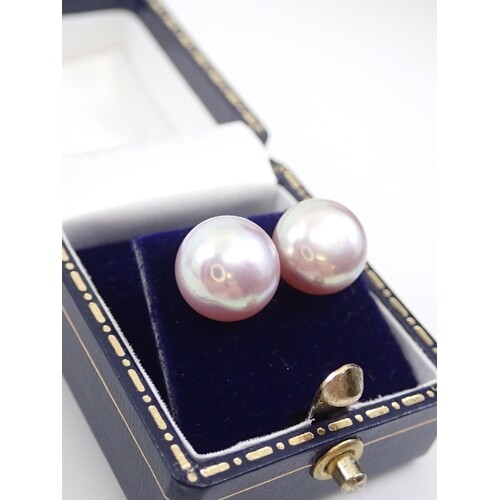 A pair of pearl stud earring