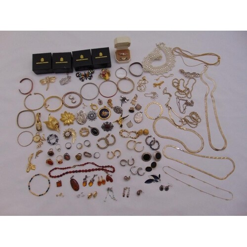 A quantity of silver and costume jewellery to include neckla...