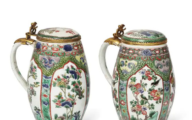A rare pair of Chinese famille verte tankards and covers Qing dynasty,...
