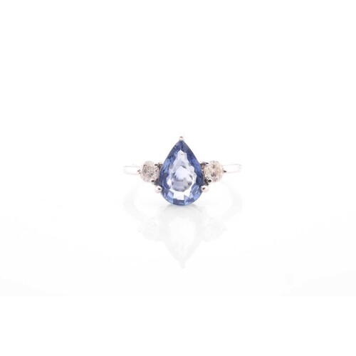 A sapphire and diamond three stone half hoop ring; the centr...