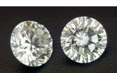 A top quality pair of brilliant cut diamonds, 0.402 carats e...