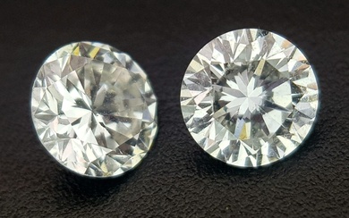 A top quality pair of brilliant cut diamonds, 0.402...