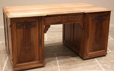 A walnut twin pedestal desk, late 19th/early 20th century, p...