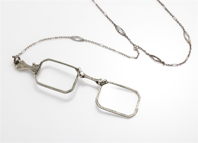 A pair of white metal framed lorgnettes with sterling silver...