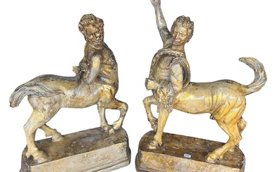 AFTER THE ANTIQUE, A DECORATIVE PAIR OF PLASTER SCULPTURES...
