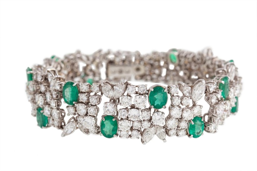 AN EMERALD AND DIAMOND FANCY BRACELET with diamonds of appro...