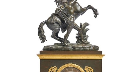 AN EMPIRE STYLE FRENCH BRONZE AND GILT METAL MANTEL CLOCK WITH A MARLY HORSE