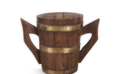 AN OAK PANEL CUP, brass bound with metal handles....