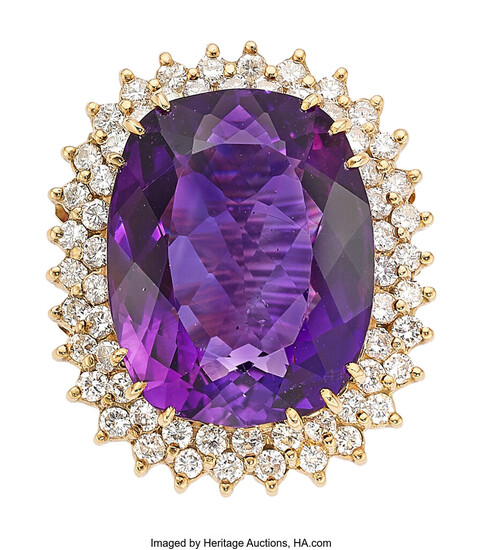 Amethyst, Diamond, Gold Ring Stones: Cushion-shaped amethyst; full-cut diamonds...