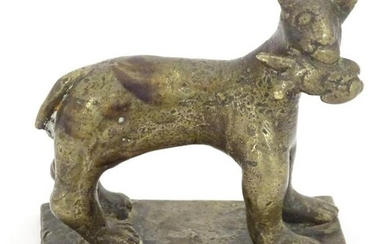 An 18th / 19th century naive bronze model of a standing