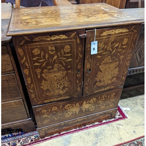 An 18th century Dutch floral marquetry walnut cabinet (alter...