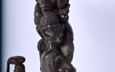 An African Makonde Carved Ebony "Tree of Life " sculpture together with a smaller Tribal carving 39