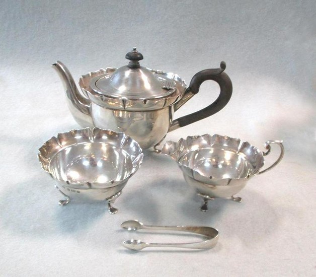 An Edward VII silver three piece bachelor's tea set