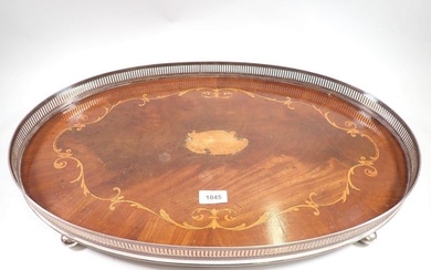 An Edwardian inlaid mahogany and silver plated galleried tra...