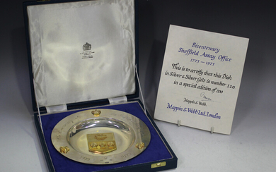 An Elizabeth II silver and silver gilt circular dish commemorating 'The Bicentenary of the Shef