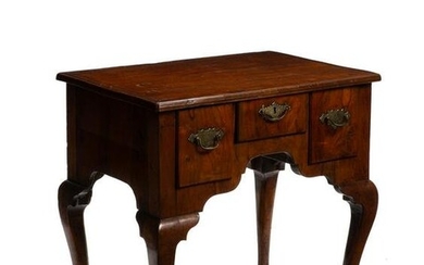 An English Queen Anne-style lowboy