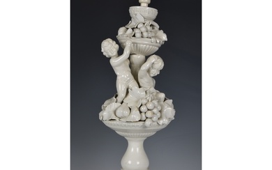 An Italian white glazed pottery table lamp, mid-20th century...