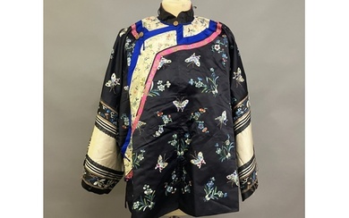 An antique Chinese embroidered silk jacket. Ru, closure to t...
