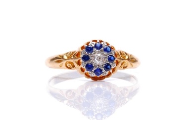 An early 20th Century 18ct sapphire and diamond cluster ring...