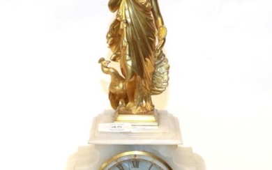 An onyx striking figural mantel clock