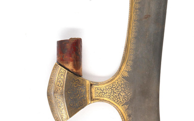 An unusual gold-koftgari steel axe head Sialkhot, 18th/ 19th Century