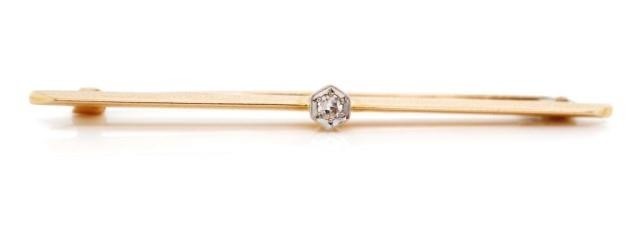 Antique 15ct rose gold and diamond bar brooch with a platinu...