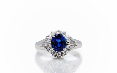 Antique Platinum Ceylon Sapphire Diamond Halo Ring