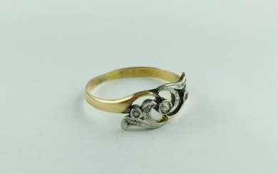 Art nouveau ring in yellow and white gold with diamonds