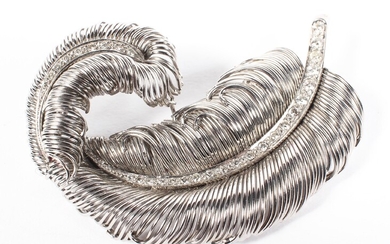 Boucheron Paris (unmarked) an 18ct white gold and diamond feather brooch. 25.4g. 6.5cm.