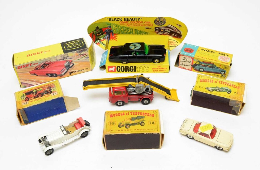 Boxed and unboxed scale model diecast vehicles.