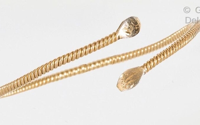 Bracelet "Snake" in 14K yellow gold twisted, forming an open...