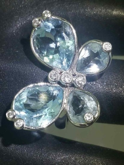 'Butterfly' ring with blue topaz and diamonds.