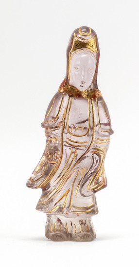 CHINESE CARVED ROCK CRYSTAL FIGURE OF GUANYIN Standing with a flower basket. Gold lacquer details and traces of red highlights. Heig...