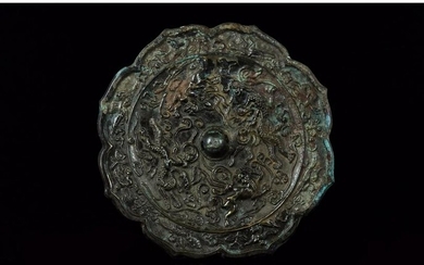 CHINESE TANG DYNASTY BRONZE MIRROR WITH ANIMALS