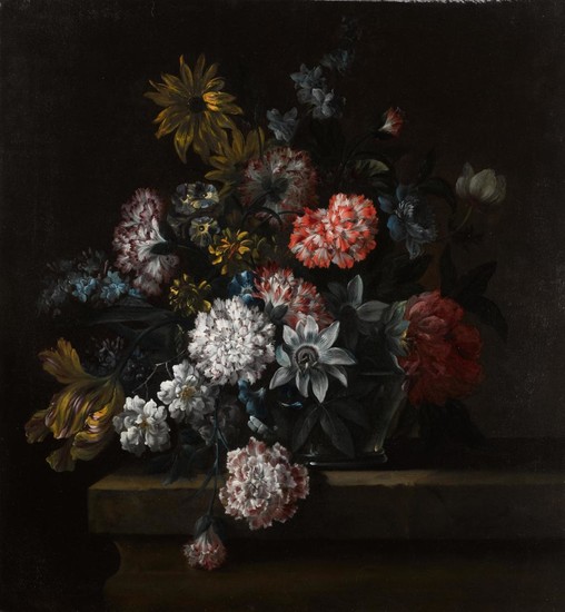 CIRCLE OF JEAN-BAPTISTE MONNOYER | A still life of carnations, morning glory, a tulip and other flowers in a glass vase resting on a ledge