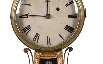 CLASSICAL PARCEL-GILT MAHOGANY BANJO CLOCK, EARLY 19TH CENTURY 39 1/2 x 11 x 4 in. (100.3 x 27.9 x 10.2 cm.)