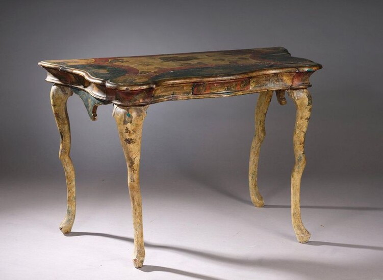 CONSOLE TABLE with moving top decorated in arte povera on a polychrome lacquered and gilded background. Curved crossbow legs.