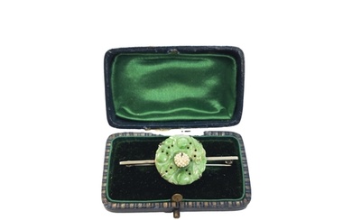 Chinese Circa 1910 A jadeite and seed pearl brooch The centr...
