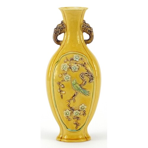 Chinese porcelain yellow ground vase with twin dragon handle...