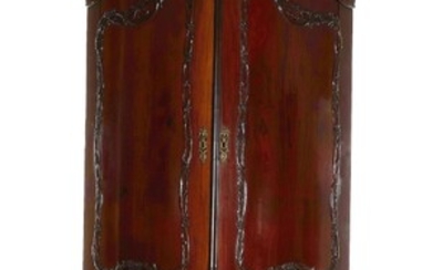 Continental carved mahogany corner cabinet