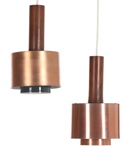 NOT SOLD. Danish design: A pair of copper and teak pendants. 1960s. H. 29. Diam. 16 cm. (2) – Bruun Rasmussen Auctioneers of Fine Art