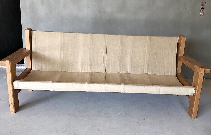 SOLD. Danish furniture design: A pine tree sofa with seat and back of canvas, the backside with straps of leather. L. 196 cm. – Bruun Rasmussen Auctioneers of Fine Art