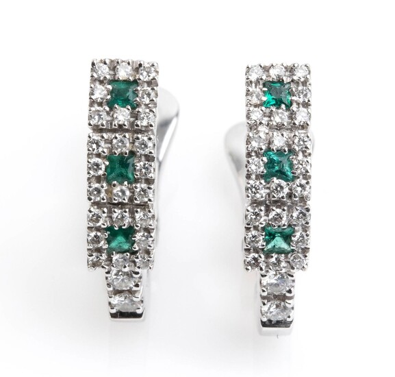 Diamonds and emeralds white gold earrings made in Italy...