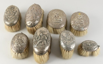 Eight silver brushes