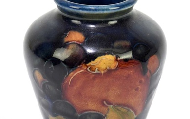 MOORCROFT; a small 'Pomegranate' pattern vase, impressed marks and impressed...