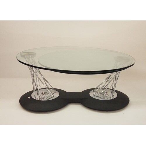Modern designer coffee table, the circular top with swivelli...