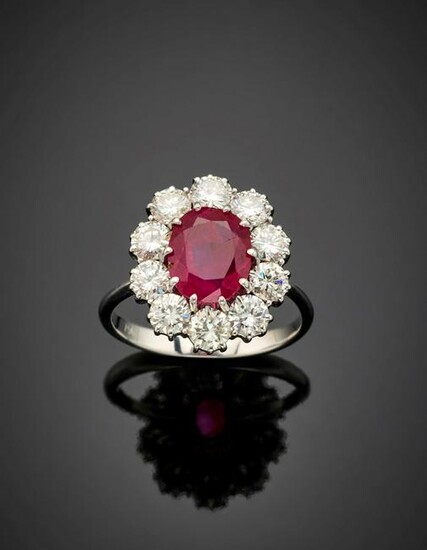 Oval ct. 2.95 ruby and round diamond white gold ring