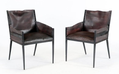 PAIR IRON AND LEATHER ARM CHAIRS MANNER OF FRANK