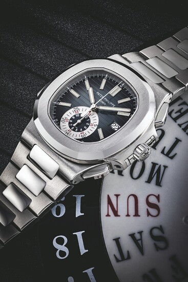 PATEK PHILIPPE. A STAINLESS STEEL AUTOMATIC CHRONOGRAPH WRISTWATCH WITH DATE AND BRACELET